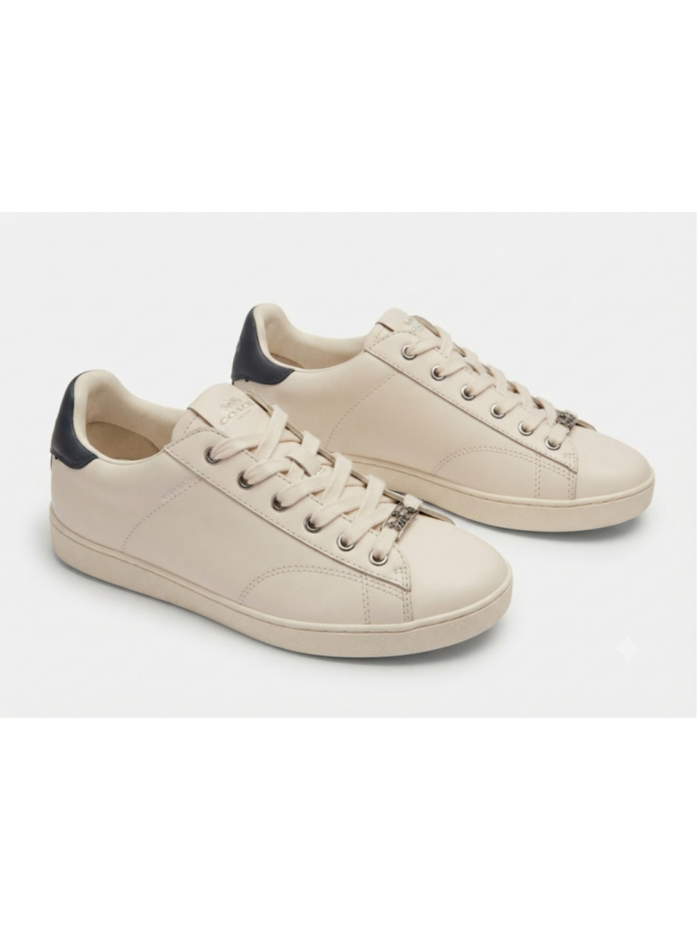 Coach Womens 9B Off White
lvory Midnight Nappa Leather
Low Top Sneakers G1905